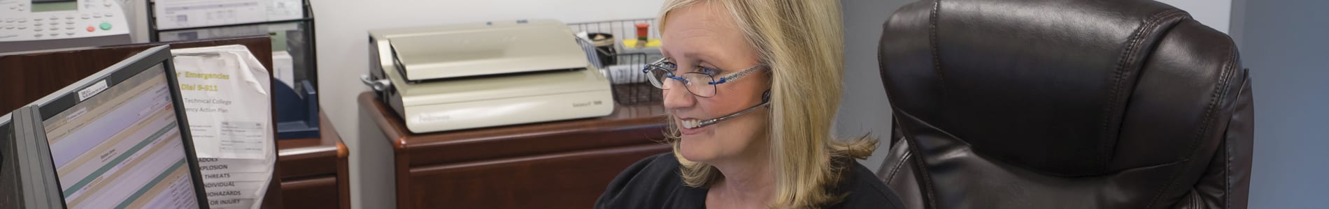 MTI admissions employee talking with student on the phone