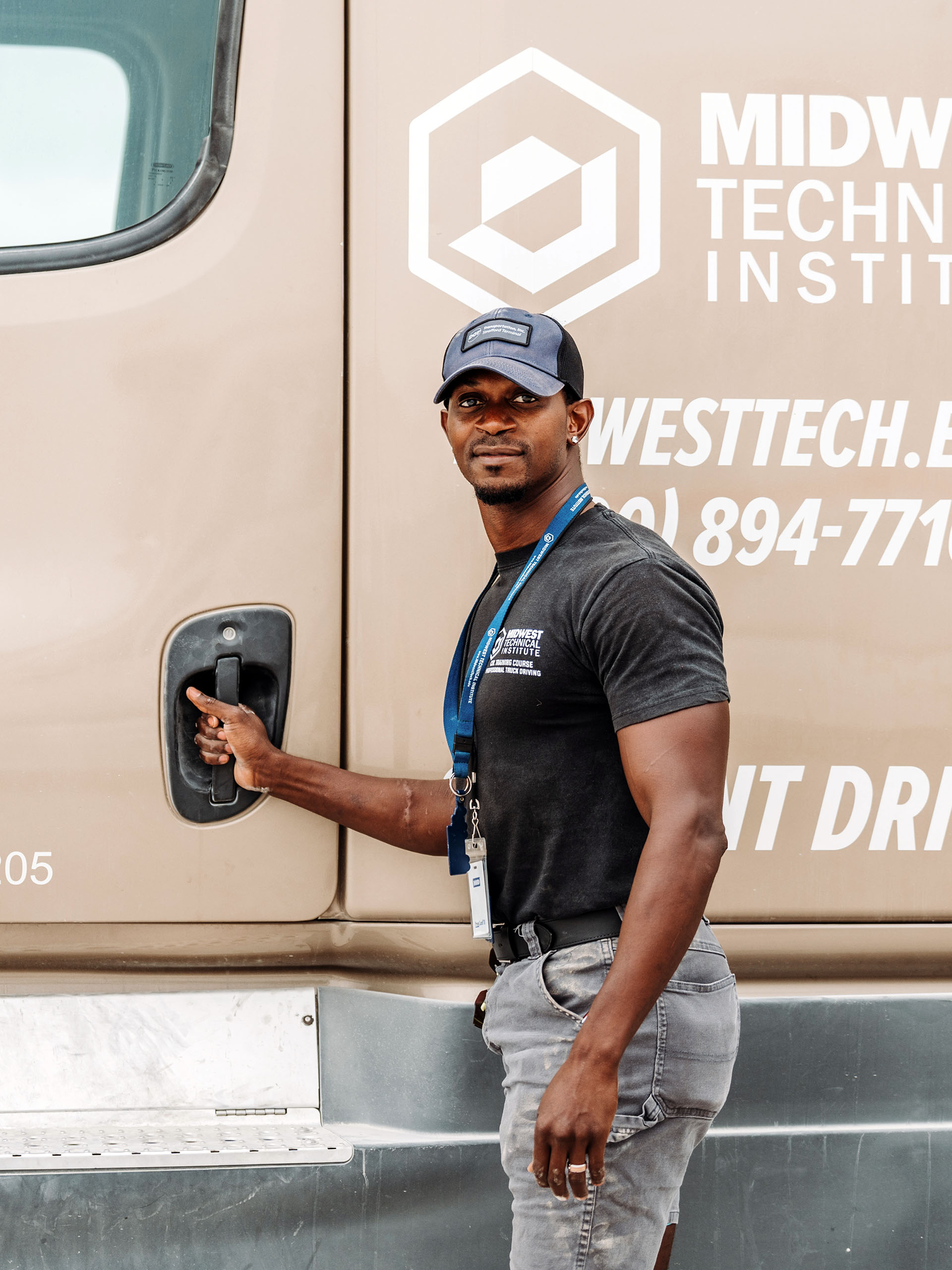 Professional Truck Driving Program Student in front of a MTI Truck