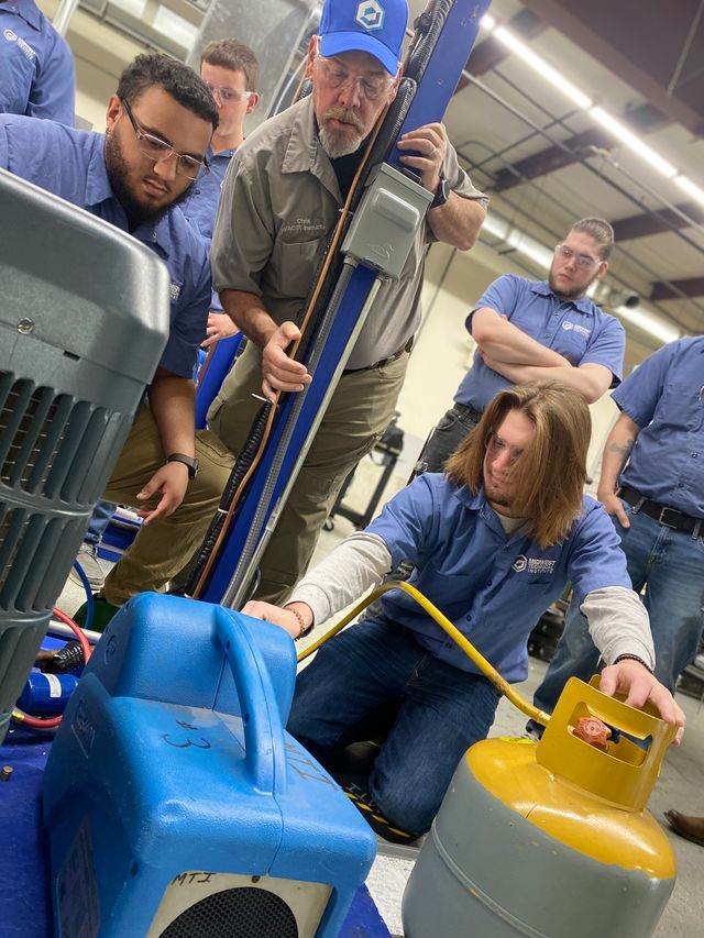 HVAC/R student learning about refrigerant recovery