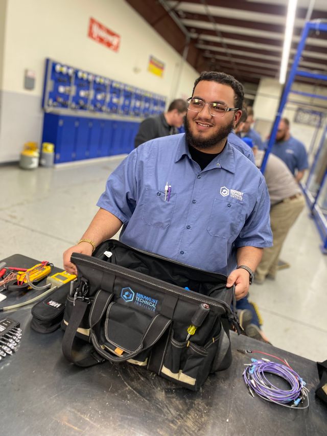 HVAC/R student learning how to use the appropriate tools